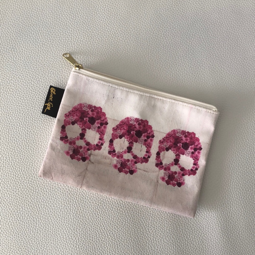 Oliver Gal Artist Co. Strawberry Skull Clutch
